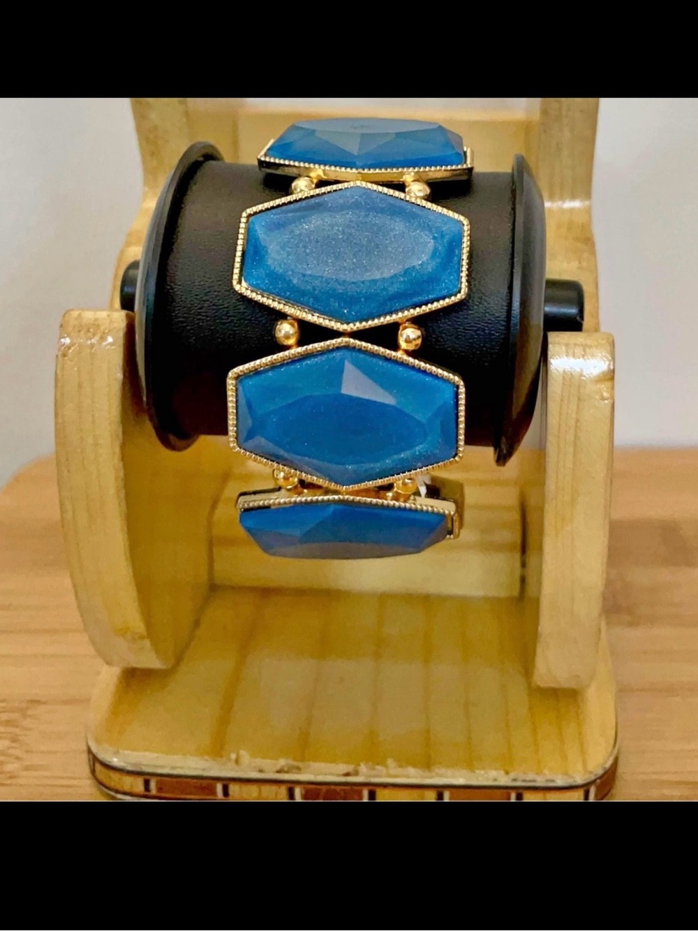 Gold-Tone Bracelet with Blue Faceted Stones